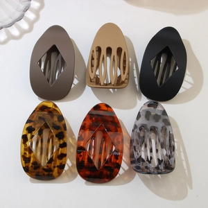 Detailed collection of leopard print and solid resin hair clips with a diamond hollow design