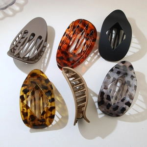 Set of six trendy leopard print and matte acrylic hair clips in various chic colors