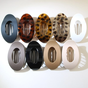 Molle per capelli ovali in nove colori inclusi nero opaco, crema e tartarugato