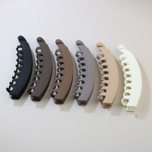 Top view of large matte banana clips in six neutral colors for thick hair styles