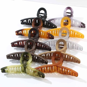 9-piece set of 13cm large hair claws in various matte colors with round handle