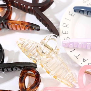 Set of assorted 13cm Korean hair claw clips in tortoiseshell and gold glitter finishes
