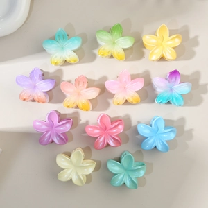 Set of 11 colorful matte flower hair claws in gradient and solid shades for women