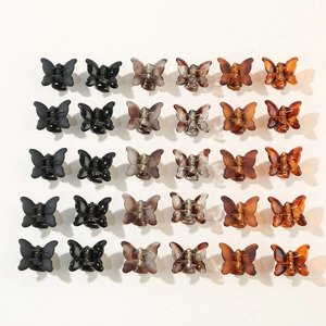Set of 30 mini butterfly hair claws in assorted matte black and tortoiseshell finishes