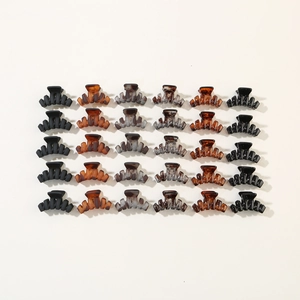 Detailed grid view of 30pcs mini hair claws in six various matte and marble textures