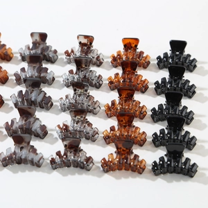 Set of 12 elegant N-shaped hair claw clips in coffee shades and marble textures