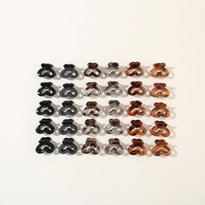 Set of 30 mini heart hair claws in solid colors and tortoiseshell textures