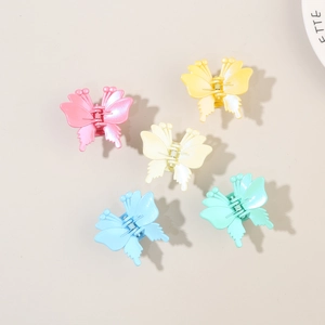 Five-piece set of butterfly hair claws in colorful macaron shades of polished plastic resin