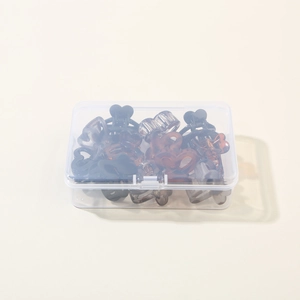 Detail of 12pcs mini heart hair clips set in transparent storage box with various colors