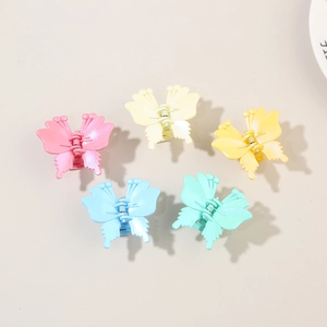 5-piece set of macaron-colored butterfly hair claws in pink yellow blue and green