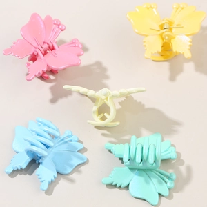 Five-piece butterfly hair claw clips in pastel macaron colors with matte finish