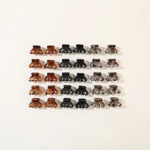 Set of 30 mini octopus hair claws in various colors for stylish hair styling