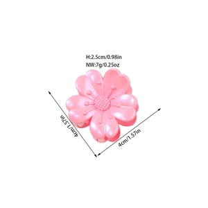 Pink floral hair claw clip in a glossy finish with precise size measurements