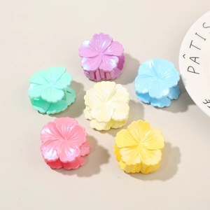 Set of six glossy hibiscus flower hair claws in assorted pastel colors for women