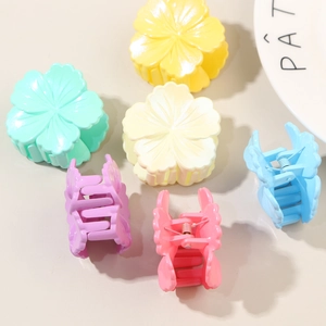 Set of six colorful glossy hibiscus flower hair claws with matte finish and metal spring