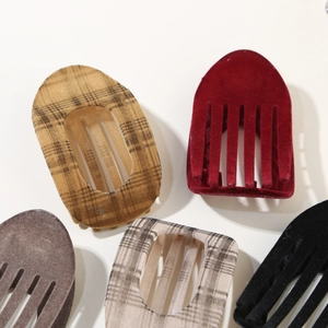 Vintage velvet hair clips collection in burgundy and plaid patterns for elegant styling