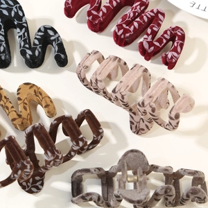 Elegant wave design flocked hair claw clips in assorted colors with floral leaf patterns
