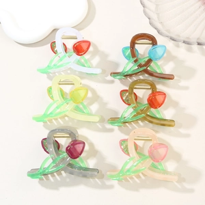 Detail view of 6-pack tulip hair claws in assorted colors with metal springs