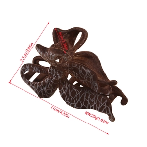 French vintage large dark brown flocked bow hair claw clip with marble texture detail
