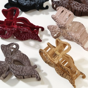 Set of large flocked bow hair claws in multiple vintage colors for a French hair style