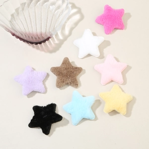 Detail view of multi-color plush star hair clip accessories for DIY crafts and hair styling