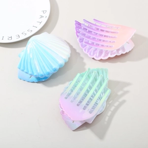Set of 3 iridescent shell hair clips in gradient blue, purple, and pink colors