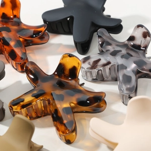 Elegant starfish hair claws in tortoise shell and matte finishes for women hair styling