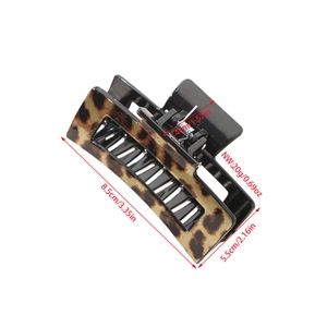 Elegant leopard print hair claw clip in rectangular resin design for stylish updos
