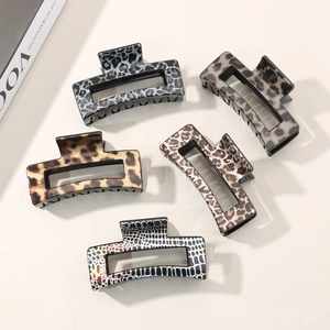 Set of five large rectangular leopard print hair claws in various stylish animal patterns