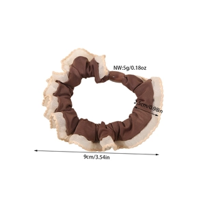 Brown faux silk scrunchie with beige lace trim and dark brown decorative buckle