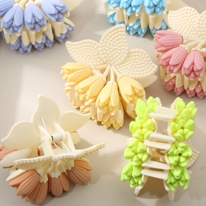 Matte tulip flower claw clips in colorful macaron shades with unique 3D leaf texture