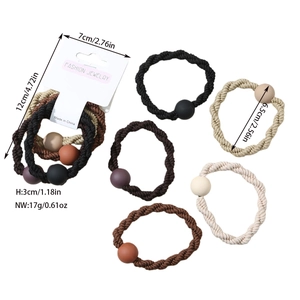 Detailed view of five-piece set of woven elastic hair ties with matte finish round beads