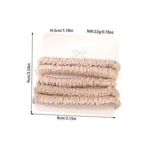 Set of 5 champagne silk hair scrunchies on card with 9x8cm dimensions and 22g weight