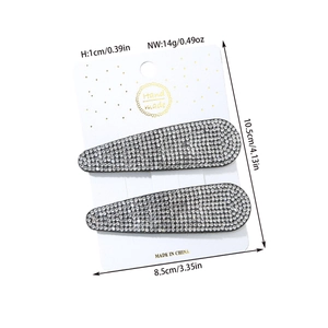 Glittering water-drop hair clips set with silver rhinestones on display card