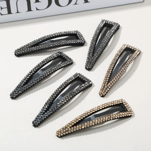 Set of six shimmering rhinestone triangle hair clips in dark grey and champagne gold