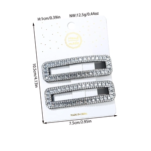 Detailed size view of silver rhinestone hair clip set with a measurement chart