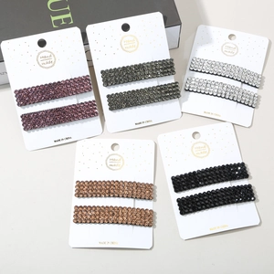 Detail of five-piece sparkling rhinestone hair clip set with rectangle design in various colors