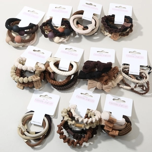 5-piece earth-tone hair elastic set with decorative beads and cute handmade leather tags