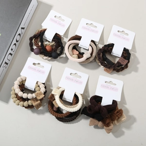Five-piece set of elegant earthy tone hair elastics with heart and rabbit charms