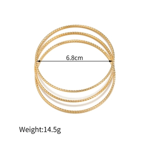 Set van vier gouden roestvrijstalen armbanden van 6,8 cm met ruitvormige textuur