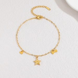 Bracelet minimaliste en acier inoxydable doré avec pendentifs cœur, étoile et os