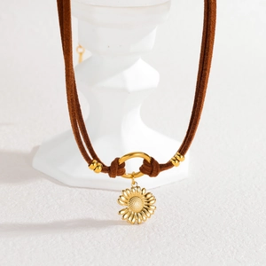 Tiger eye sunflower pendant necklace with brown suede cord and gold stainless steel accents