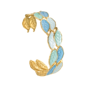 Golden C-shaped bracelet featuring colorful enamel leaves in white, blue, and green tones