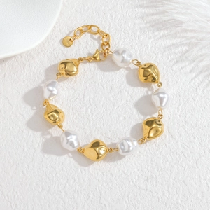 Detailed view of baroque pearls and irregular stainless steel beads on the bracelet