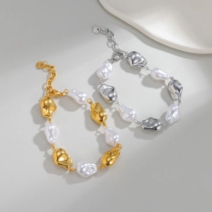 Baroque irregular pearl and metal bracelet in gold and silver stainless steel