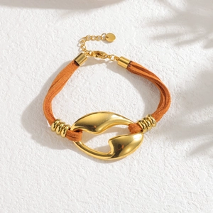 Bracelet vintage en cuir orange avec boucles dorées polies et anneaux métalliques