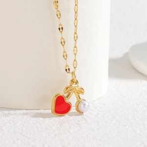 18k gold plated long necklace with cherry-style heart and pearl pendant on a chain