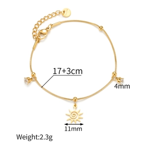 Detail showing dimensions of gold stainless steel sun and crystal charms on a snake chain