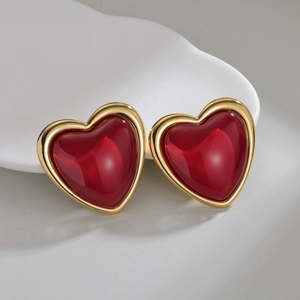 Vintage red heart stud earrings with elegant gold metal frame for classic retro style