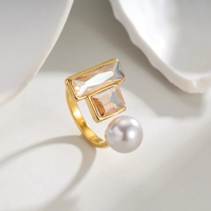 Vintage geometric gold ring featuring rectangle amber stones and a large white pearl